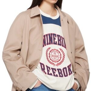 Anine Bing: Reebok Women’s White, Blue, and Red Crewneck Sweater